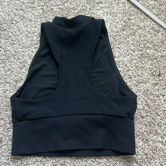 Size X-small tank top, made in China and brand is Industry. - Picture 2 of 3